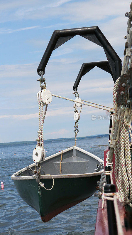 Offshore Rescue Vessel Hanging Lifeboat Canoe from Ship at Sea